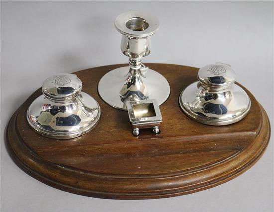 A George V silver desk set on a mahogany stand, 25cm.